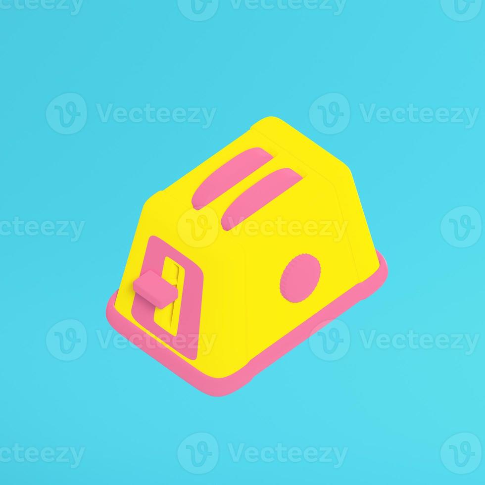 Yellow toaster on bright blue background in pastel colors. Minimalism concept photo