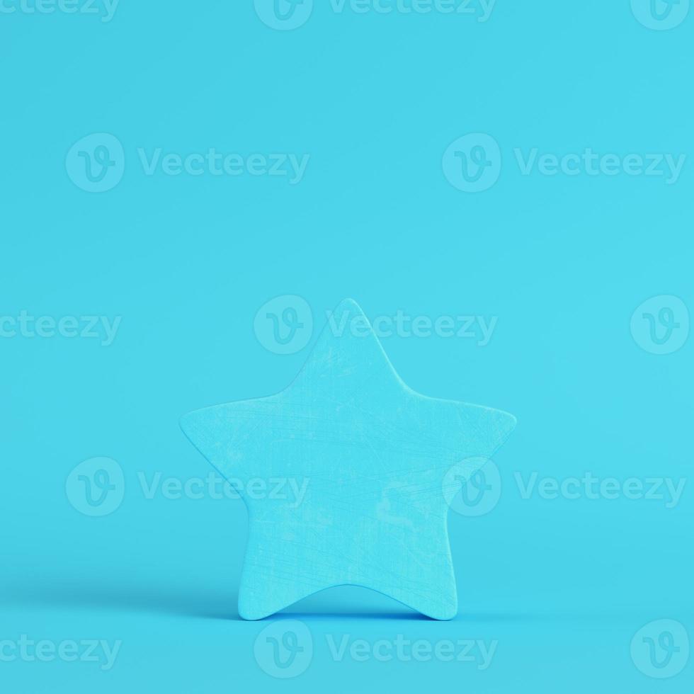 Abstract star on bright blue background in pastel colors photo