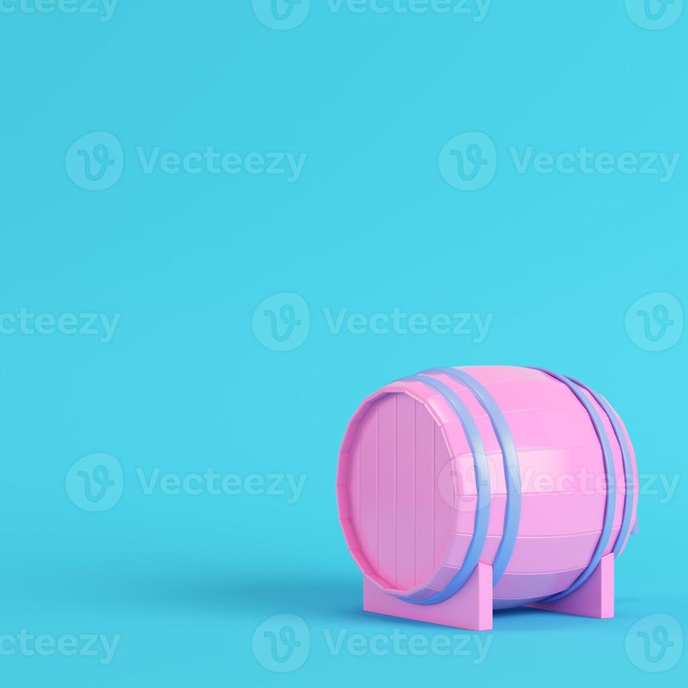 Pink barrel with a tap on bright blue background in pastel colors photo