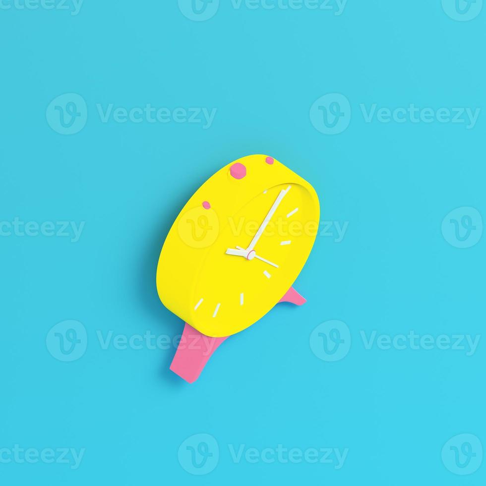 Yellow retro alarm clock on bright blue background in pastel colors. Minimalism concept photo