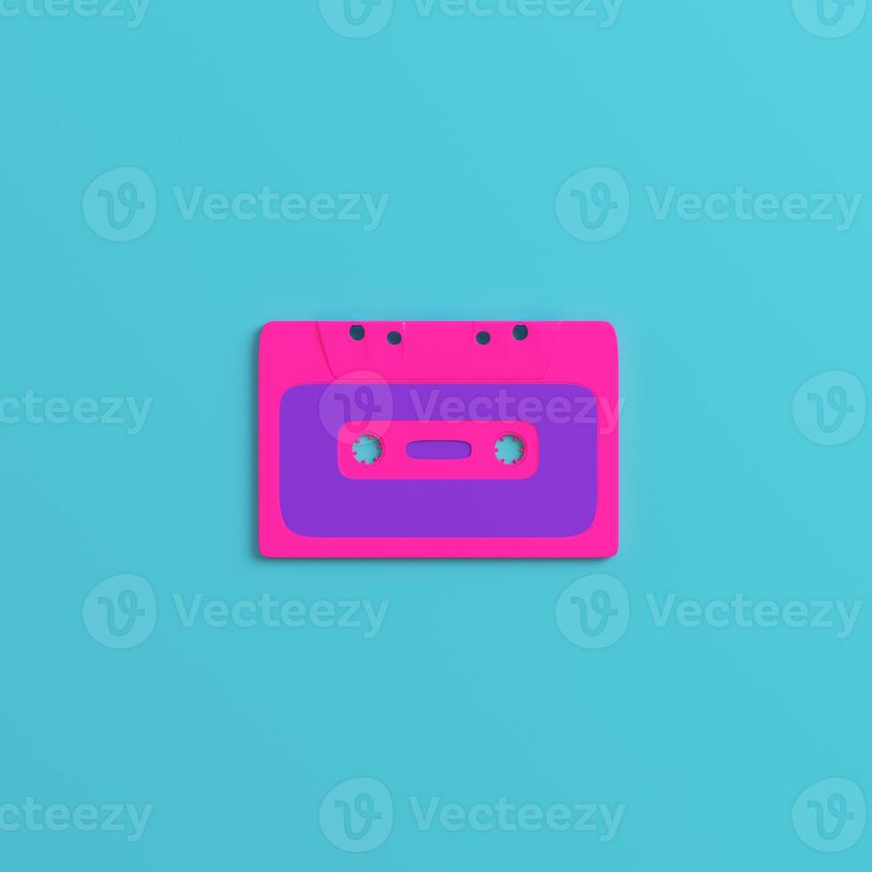 Audio cassette tape on bright blue background. Minimalism concept photo