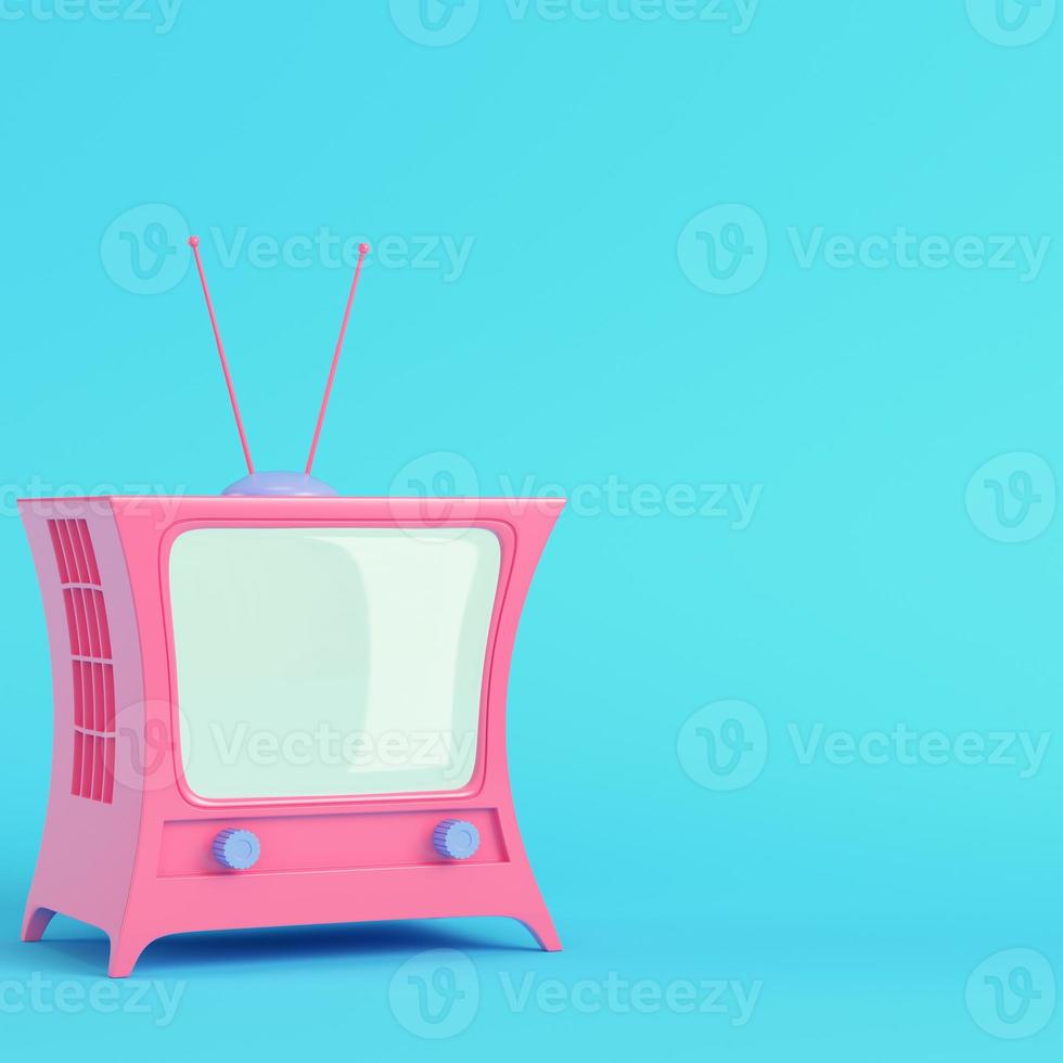 televisión de estilo de dibujos animados rosa sobre fondo azul brillante en colores pastel foto