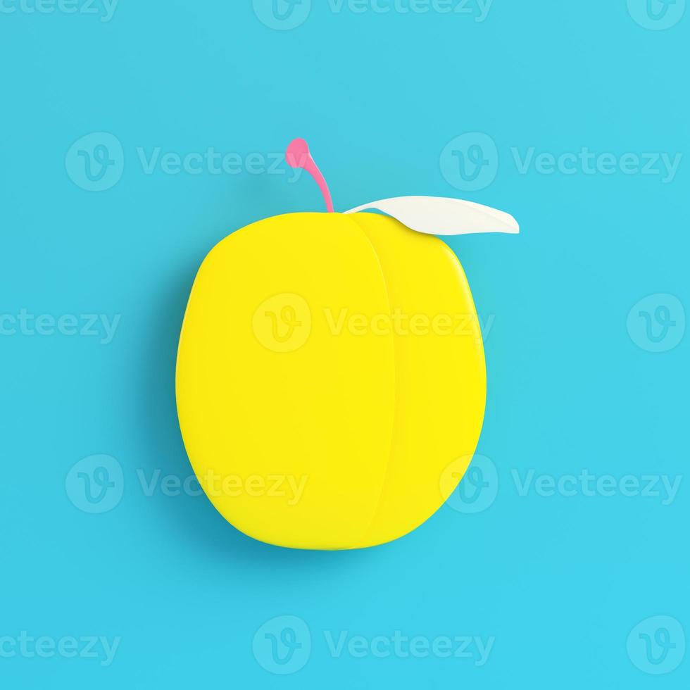 Yellow plum on bright blue background in pastel colors photo