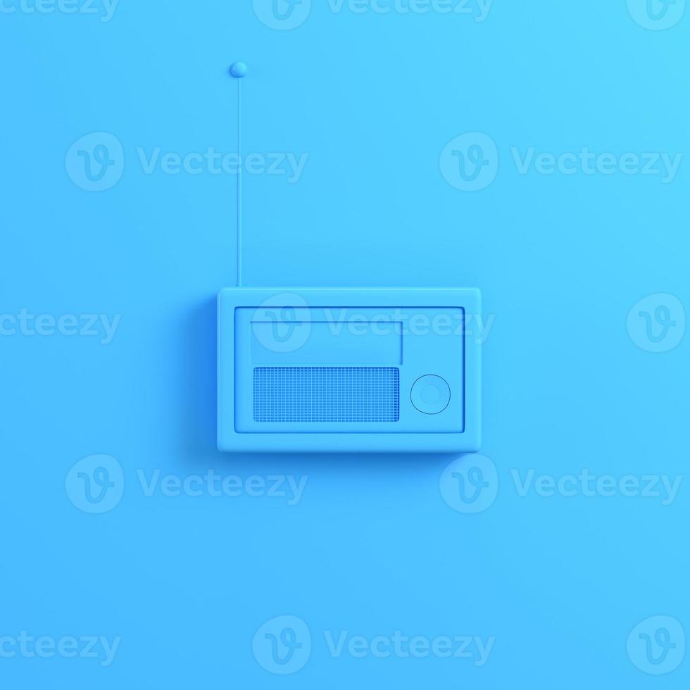 Radio on bright blue background photo