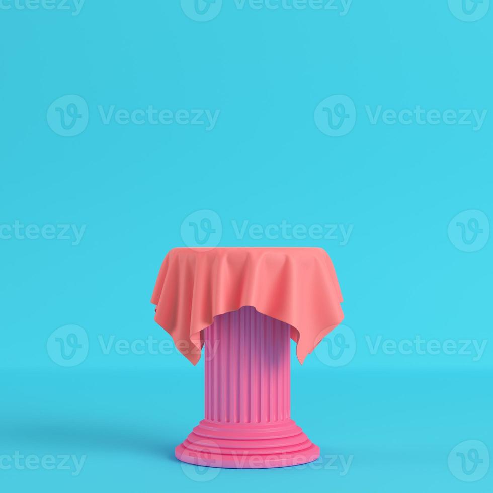 Cloth on a pedestal on bright blue background in pastel colors photo