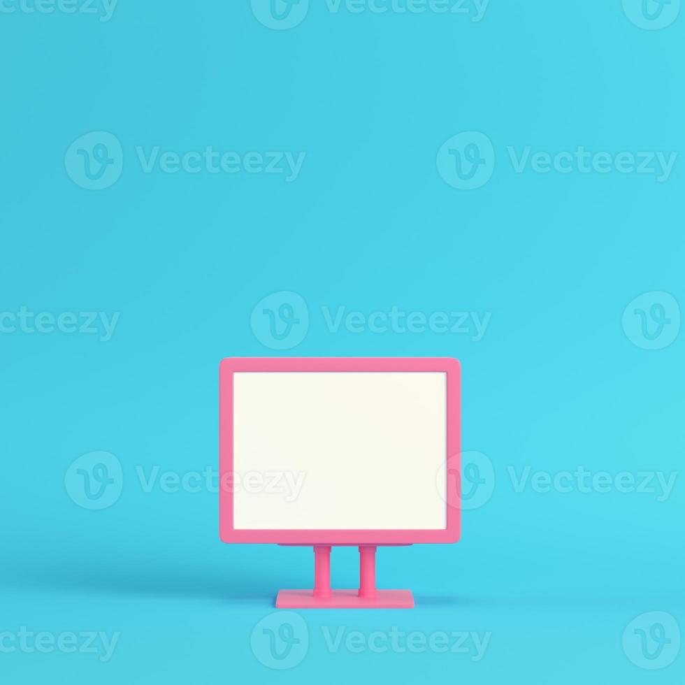 Pink blank advertising billboard on bright blue background in pastel colors photo
