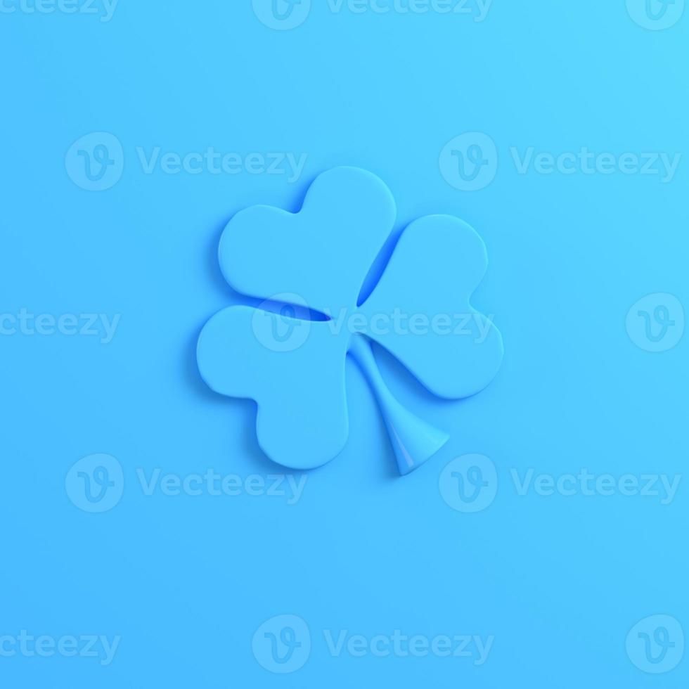 Clover on bright blue background photo