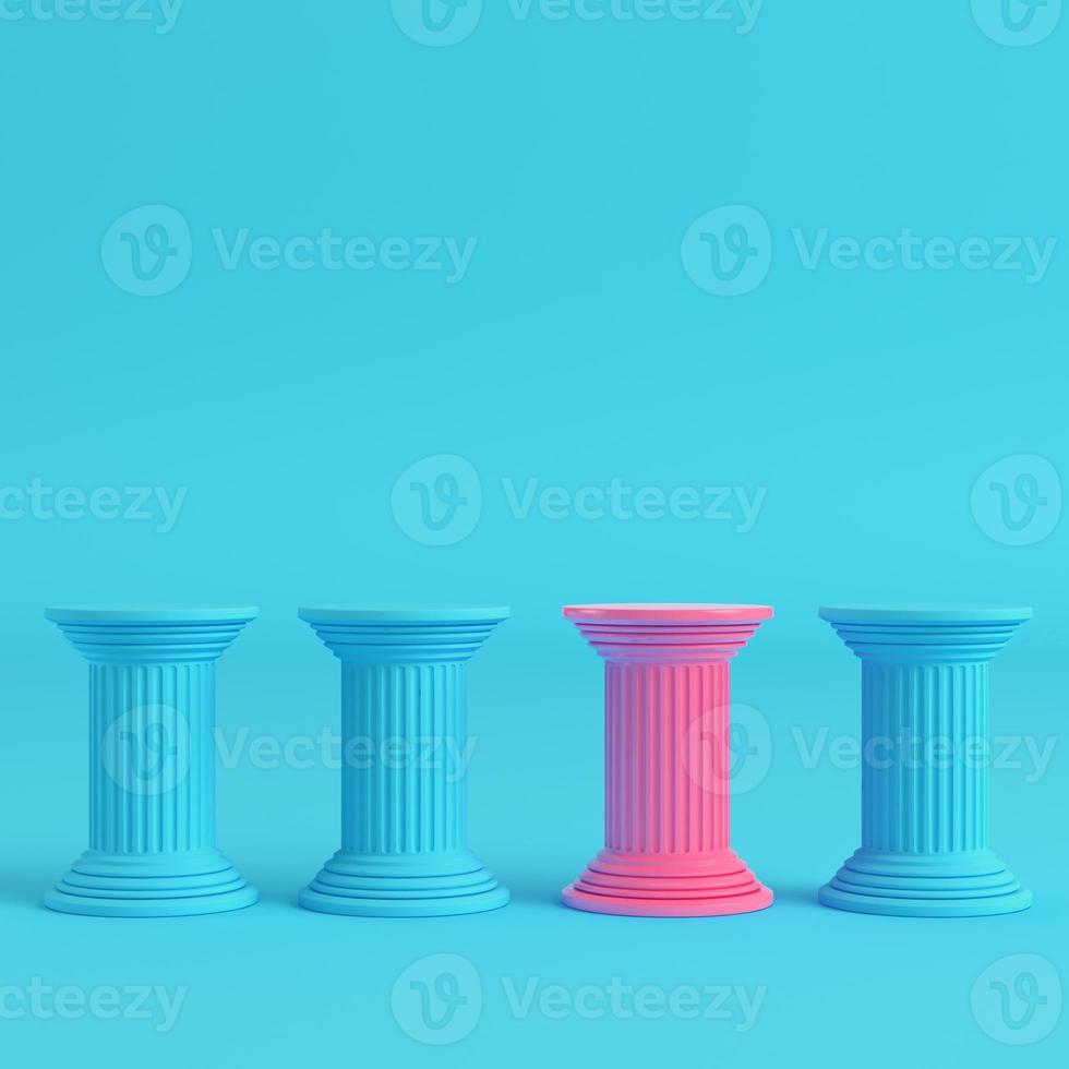 Four ancient pillars on bright blue background in pastel colors photo