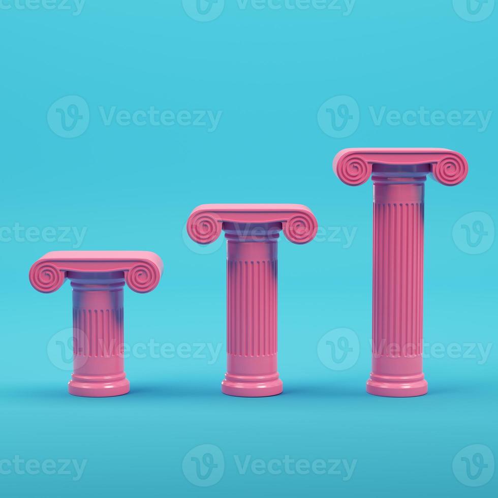 Pink three ancient columns on bright blue background in pastel colors photo