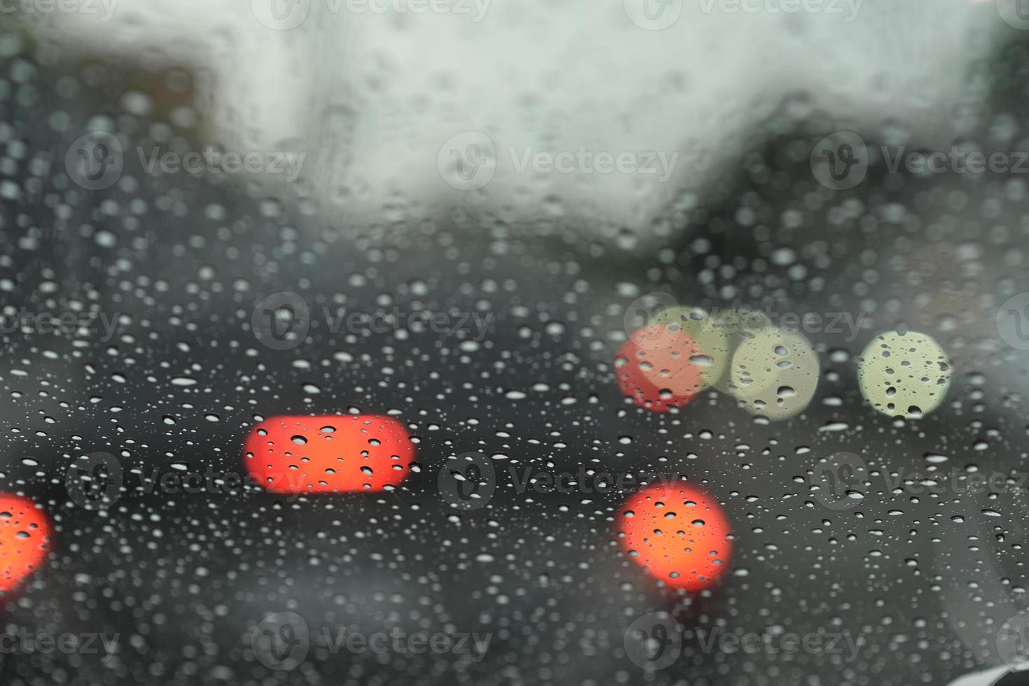 Raining while driving, view from inside photo