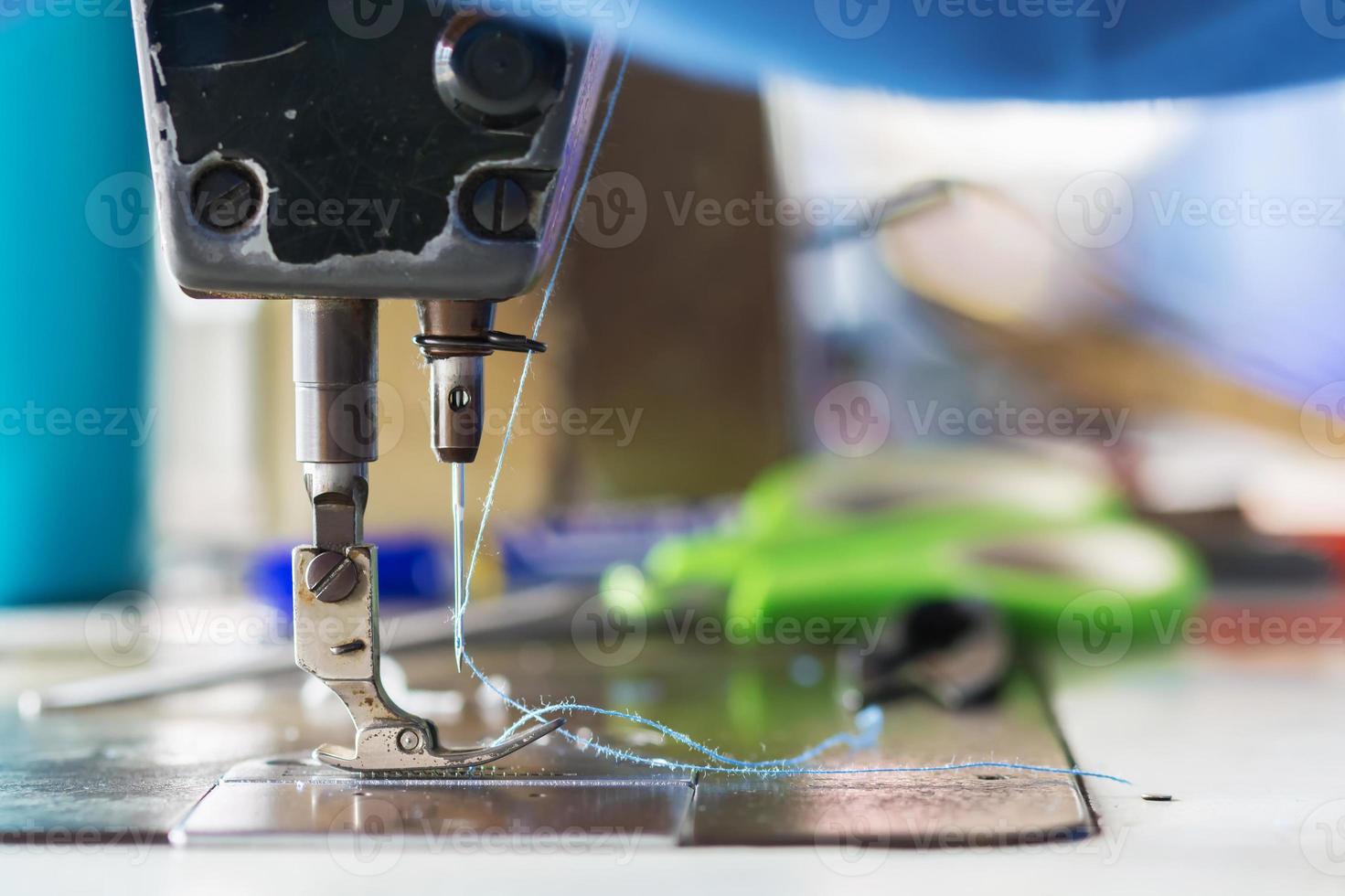 Sewing machine in Sewing Process. photo
