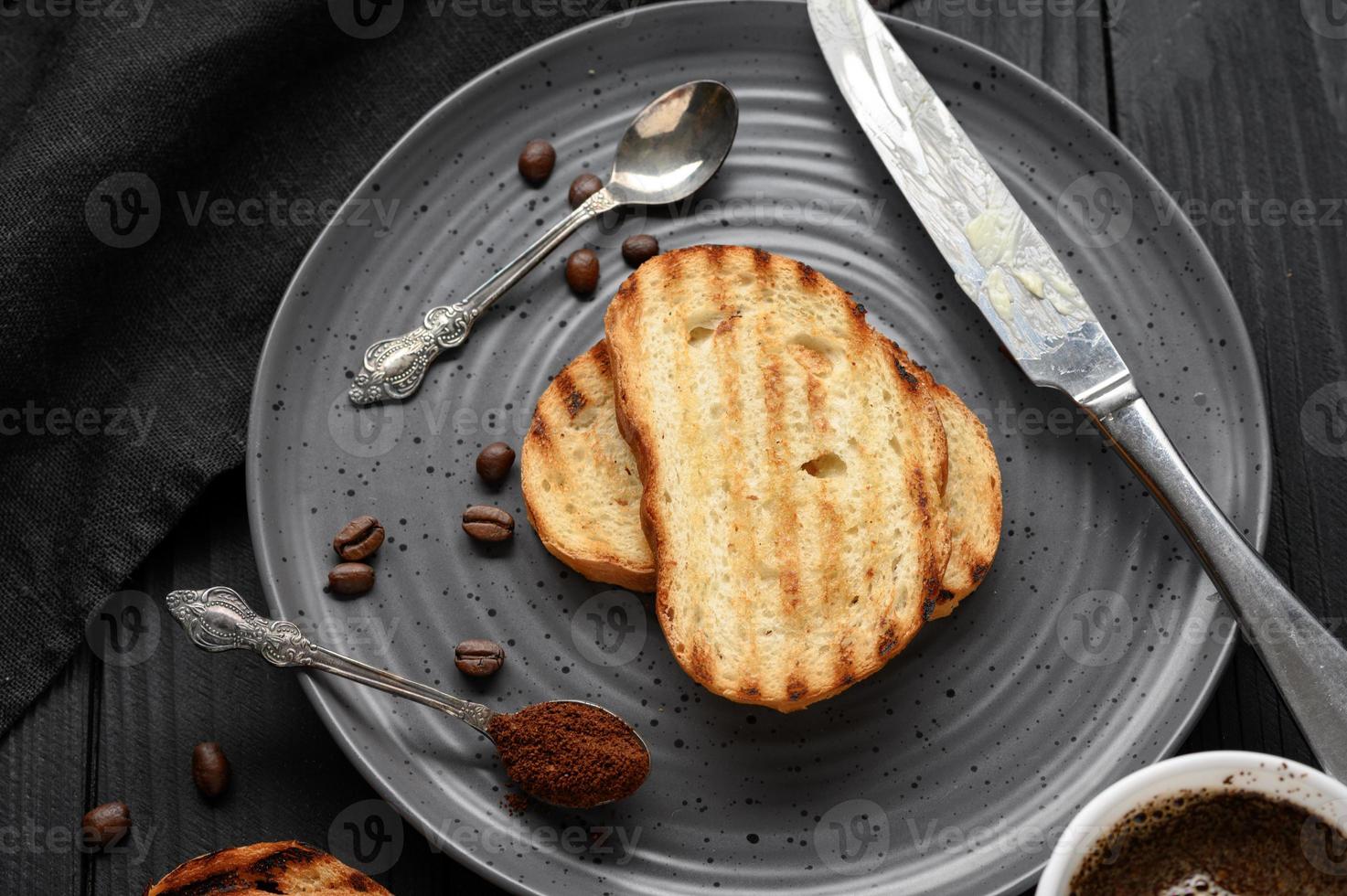 Continental Breakfast meal served with coffee, toast, jam and butter. Delicious coffee table. photo