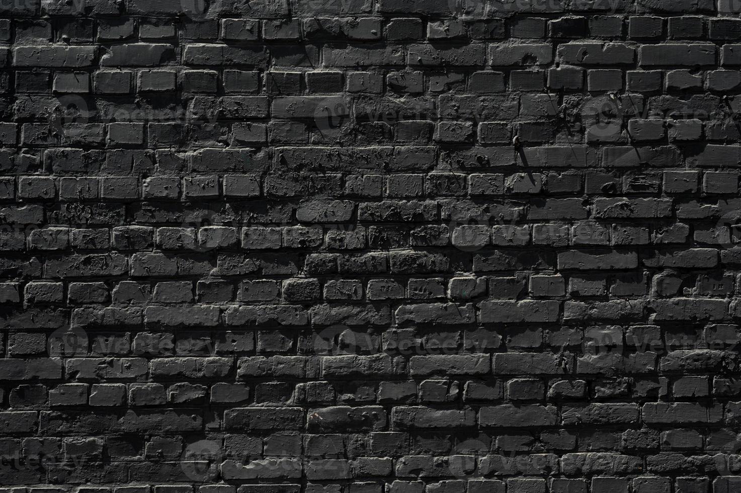 Old black brick wall texture ,brick wall texture for interior design vintage dark tone. photo