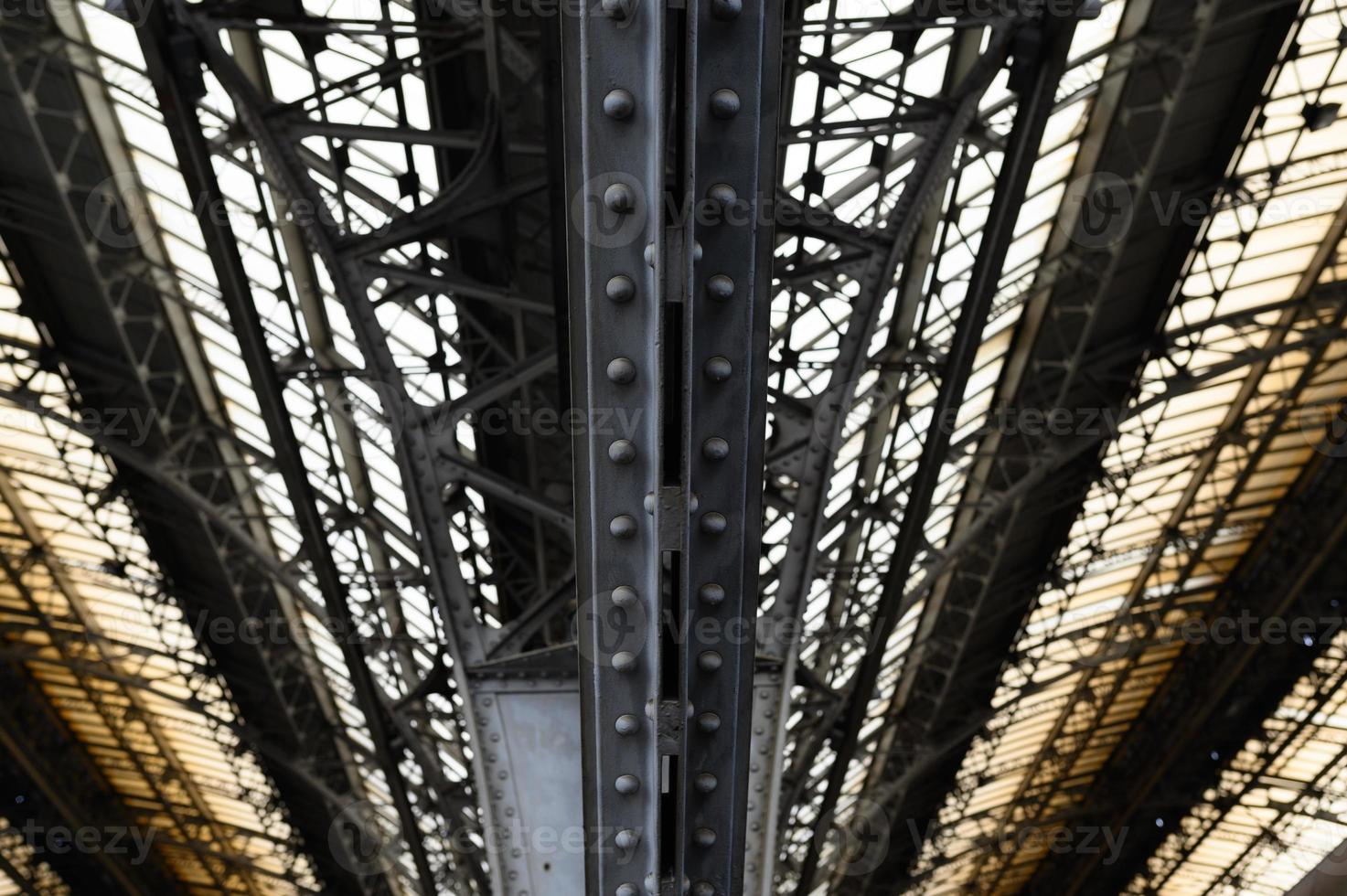 Metal arched frame construction of the old railway station in Europe photo