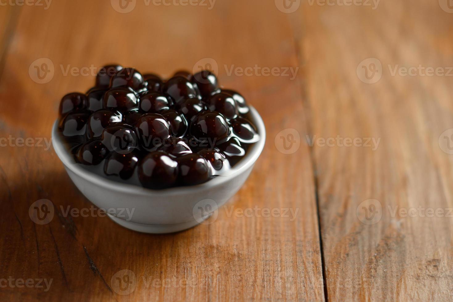 Black pearls. Boiled tapioca pearls for bubble tea photo
