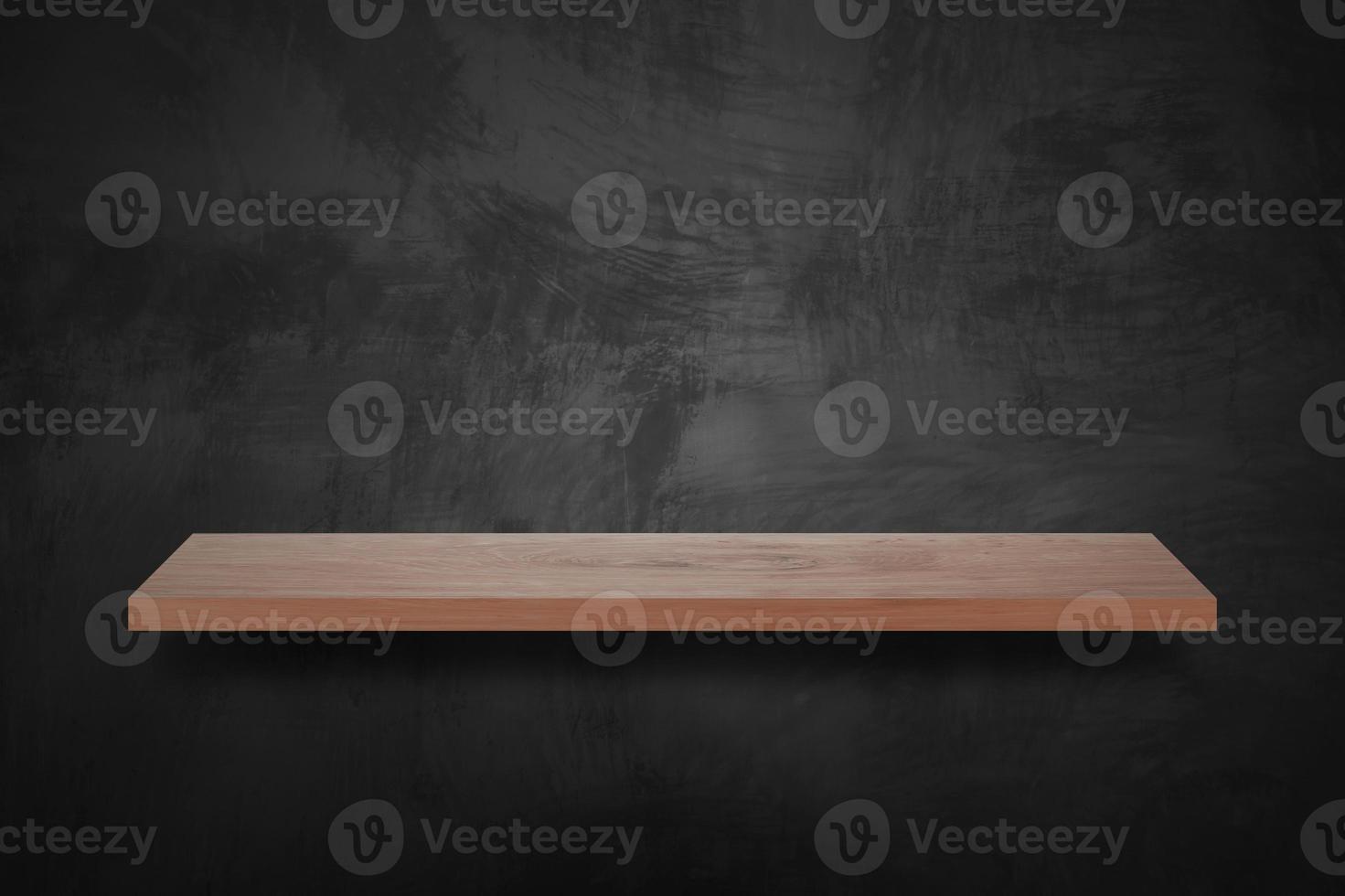 Empty wood bar with grunge black wall background photo