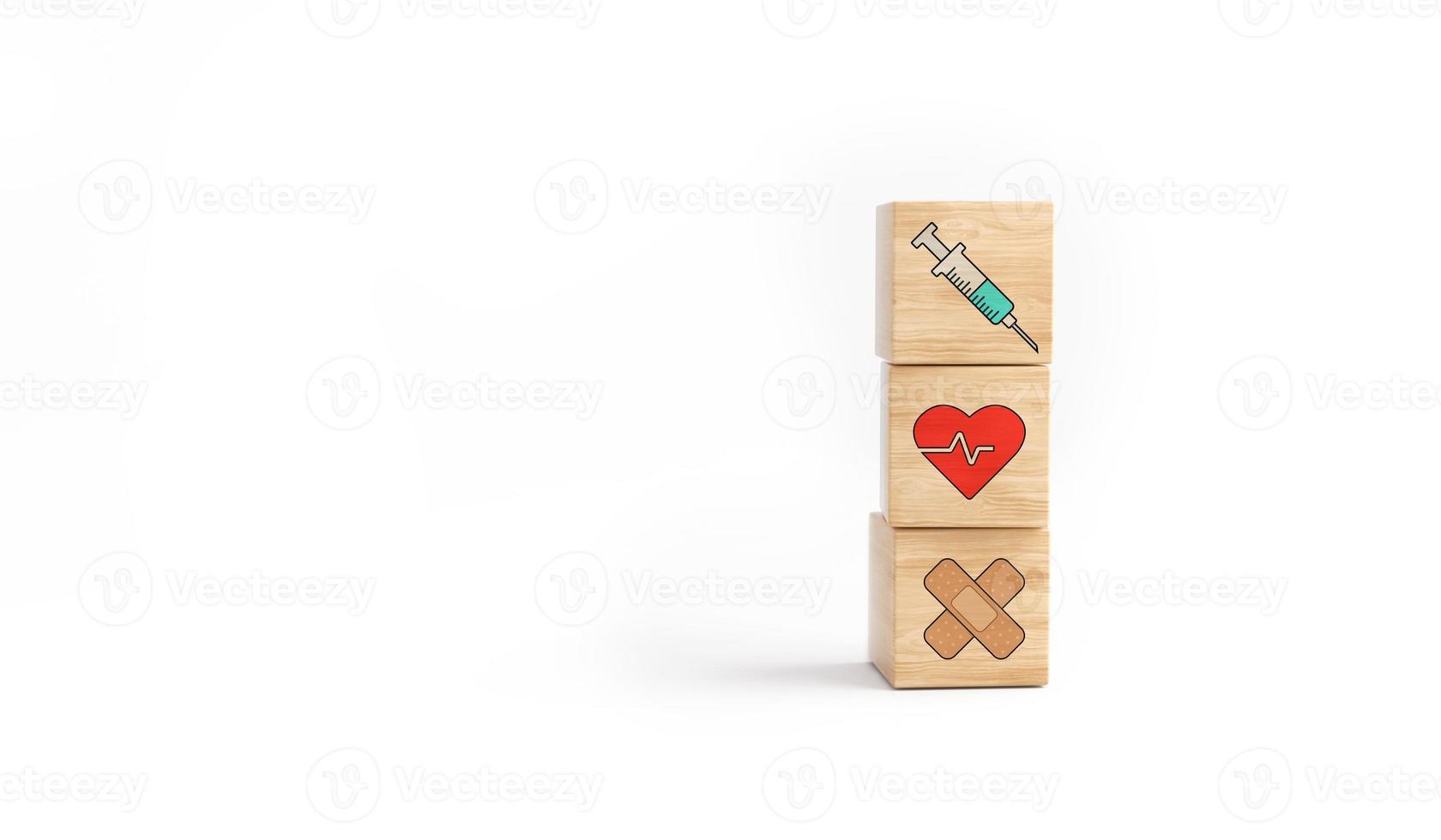 Wooden cube block tower with healthcare icon syringe, health and band on white background. photo