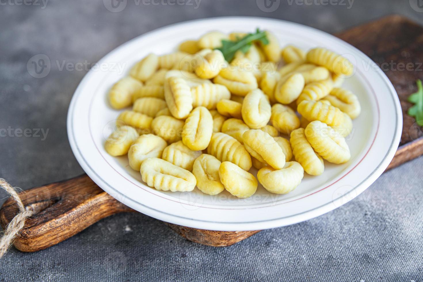 gnocchi raw dough, potatoe cuisine fresh meal food snack on the table copy space food background rustic photo