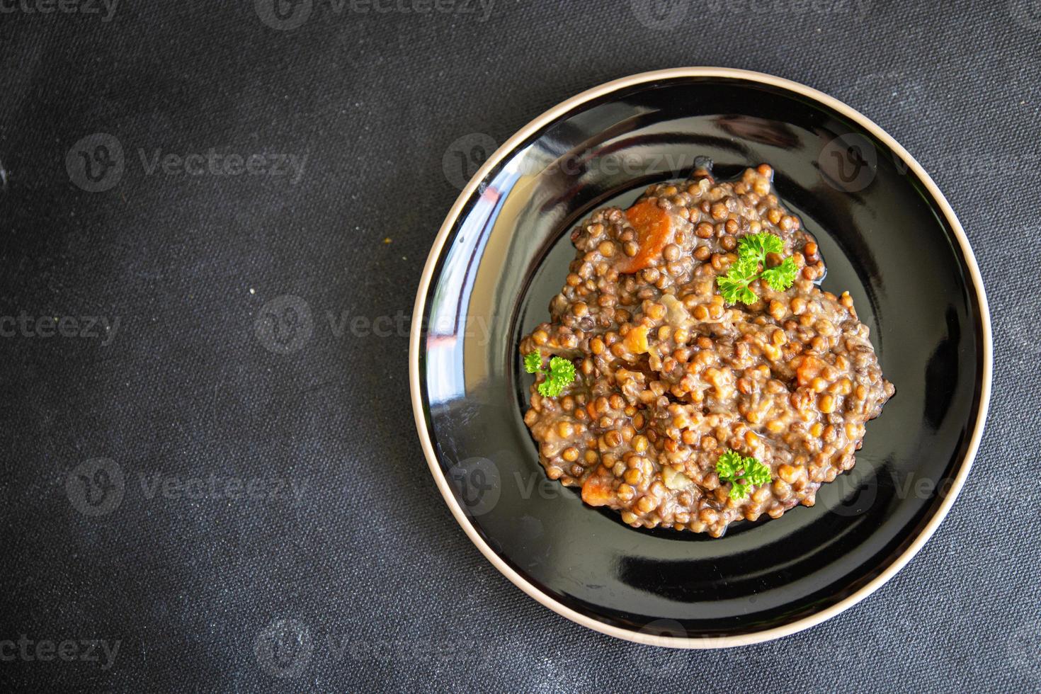 lentils with vegetables cuisine fresh healthy meal food snack diet on the table copy space food background rustic top view keto or paleo diet veggie vegan or vegetarian photo