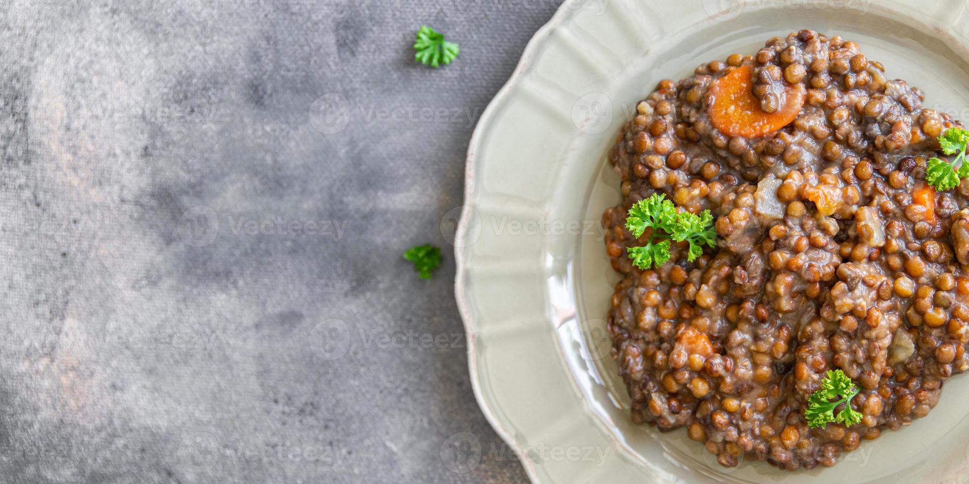 lentils with vegetables cuisine fresh healthy meal food snack diet on the table copy space food background rustic top view keto or paleo diet veggie vegan or vegetarian photo