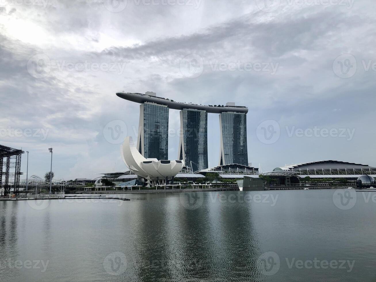 Singapore July 3 2022 Cloudy view at the Marina Bay sands and Helix Bridge in Singapore landmarks photo