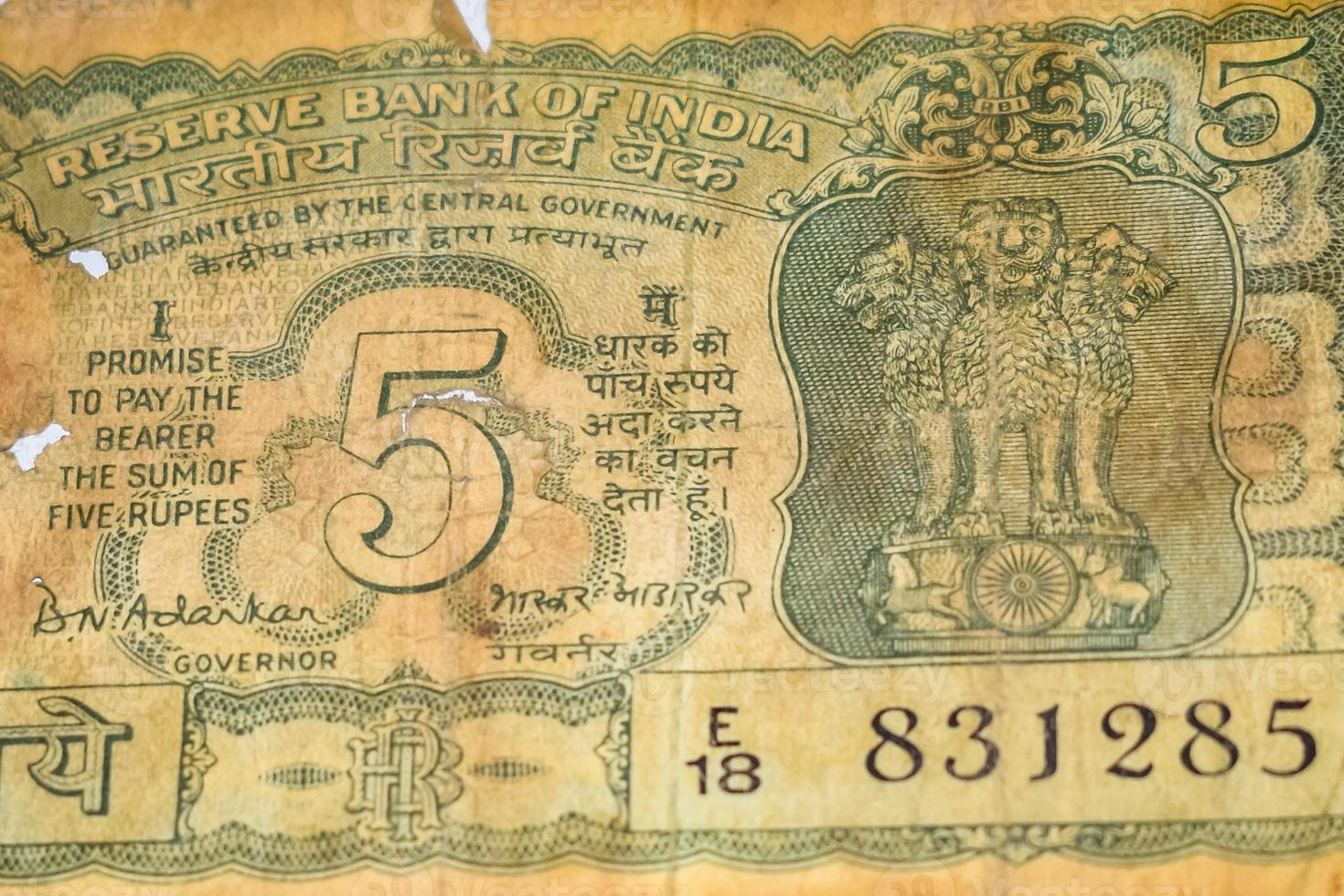 Rare Old Five Rupee notes combined on the table, India money on the rotating table. Old Indian Currency notes on a rotating table, Indian Currency on the table photo