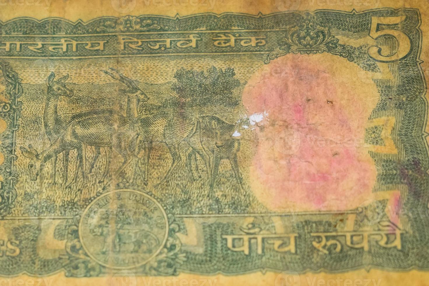 Rare Old Five Rupee notes combined on the table, India money on the rotating table. Old Indian Currency notes on a rotating table, Indian Currency on the table photo