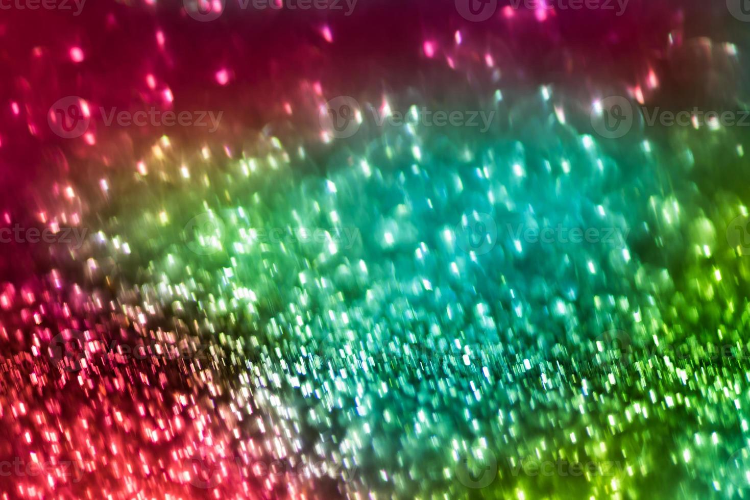 bokeh effect glitter colorful blurred abstract background for birthday, anniversary, wedding, new year eve or Christmas photo