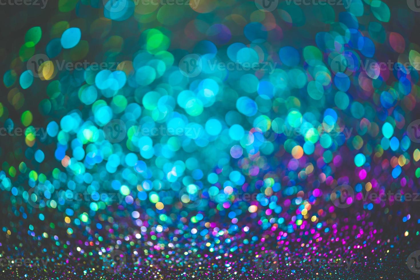 bokeh effect glitter colorful blurred abstract background for birthday, anniversary, wedding, new year eve or Christmas photo