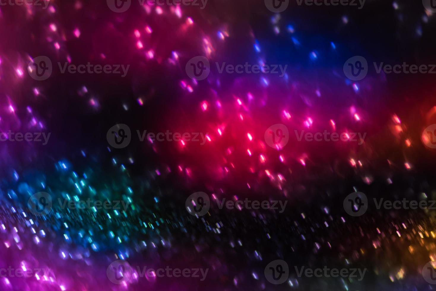 bokeh effect glitter colorful blurred abstract background for birthday, anniversary, wedding, new year eve or Christmas photo