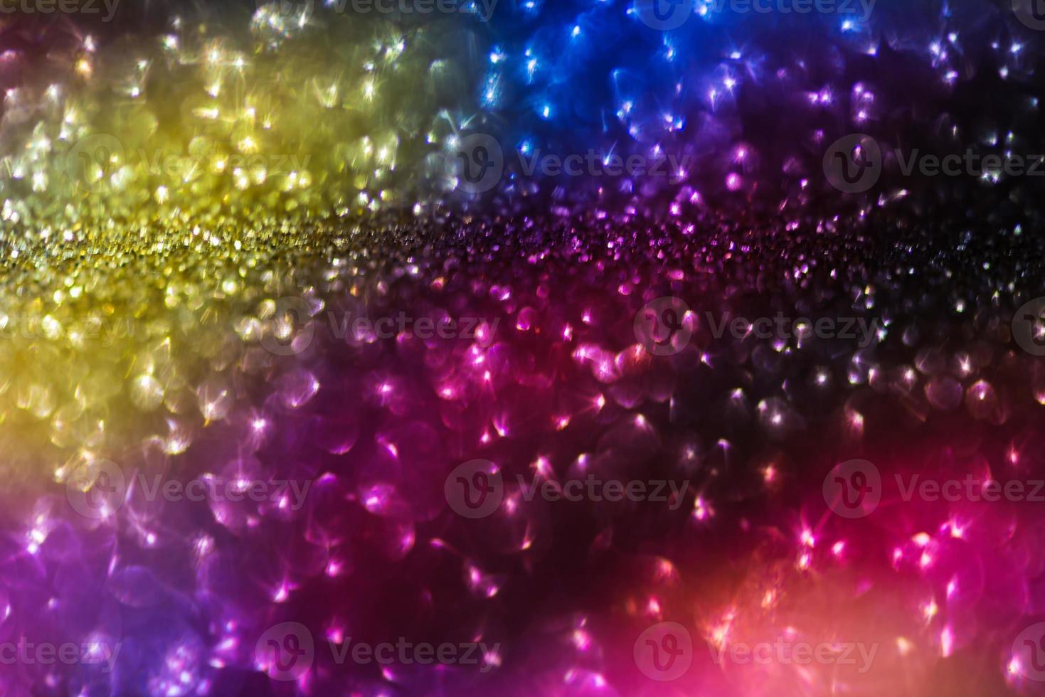 bokeh effect glitter colorful blurred abstract background for birthday, anniversary, wedding, new year eve or Christmas photo
