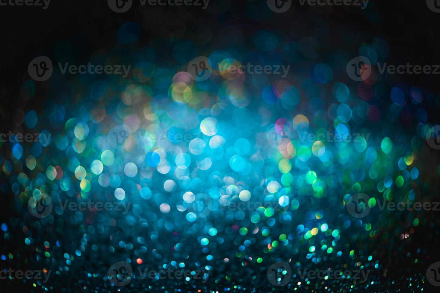 bokeh effect glitter colorful blurred abstract background for birthday, anniversary, wedding, new year eve or Christmas photo