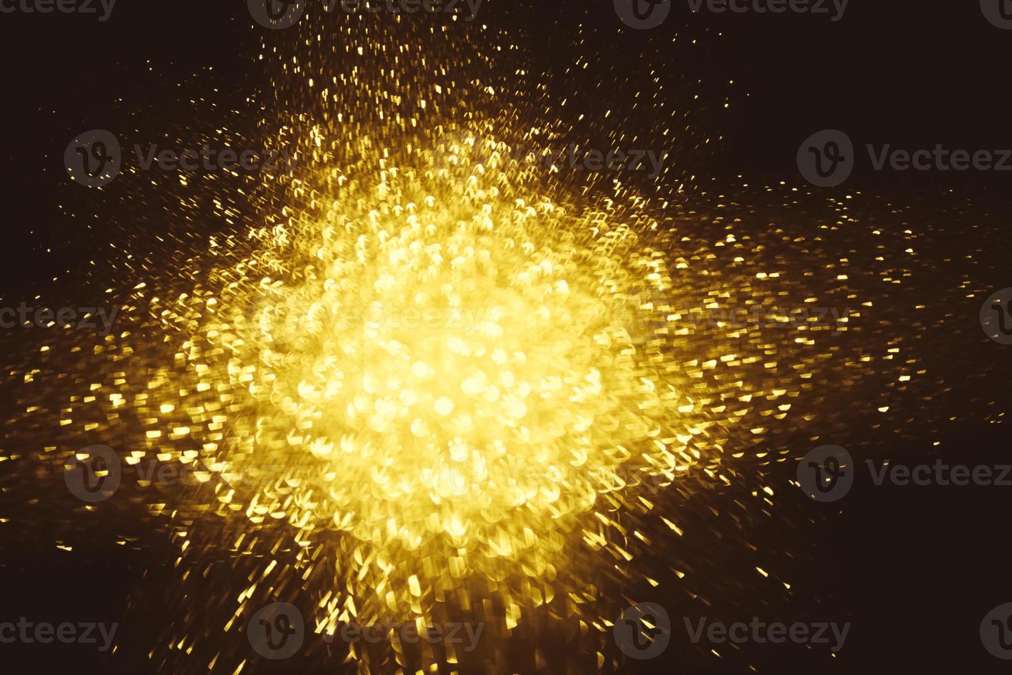Golden glitter bokeh lighting texture Blurred abstract background for birthday, anniversary, wedding, new year eve or Christmas photo