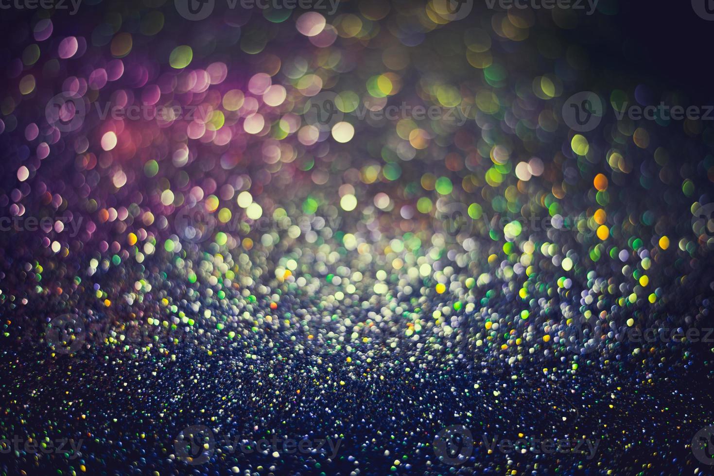 bokeh effect glitter colorful blurred abstract background for birthday, anniversary, wedding, new year eve or Christmas photo