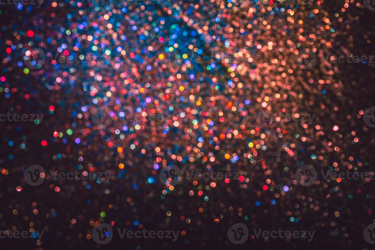 bokeh effect glitter colorful blurred abstract background for birthday, anniversary, wedding, new year eve or Christmas photo