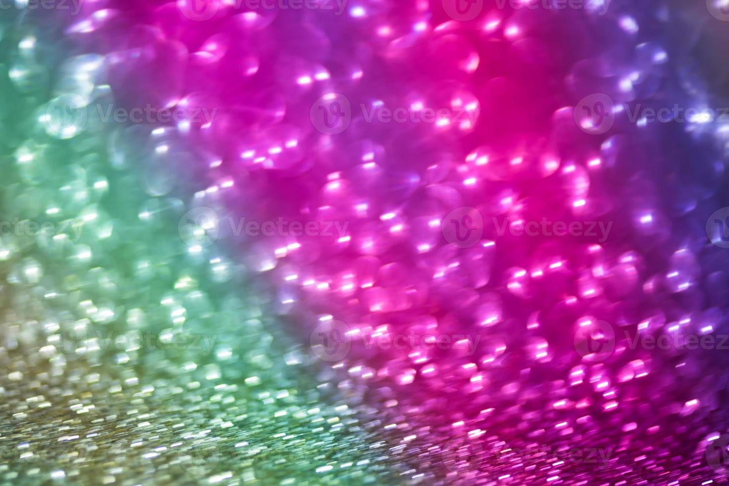 bokeh effect glitter colorful blurred abstract background for birthday, anniversary, wedding, new year eve or Christmas photo