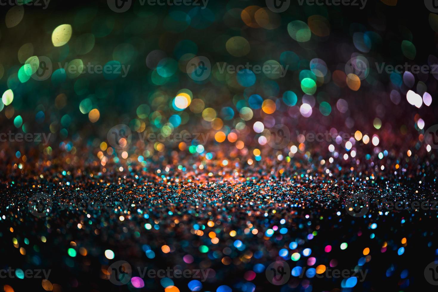 bokeh effect glitter colorful blurred abstract background for birthday, anniversary, wedding, new year eve or Christmas photo