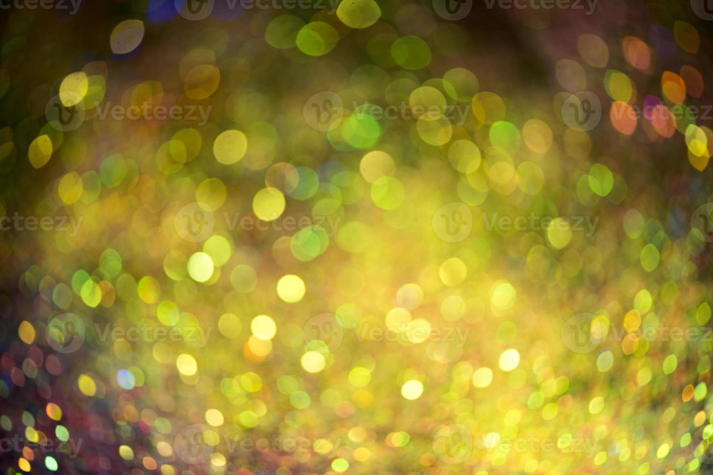 bokeh effect glitter colorful blurred abstract background for birthday, anniversary, wedding, new year eve or Christmas photo