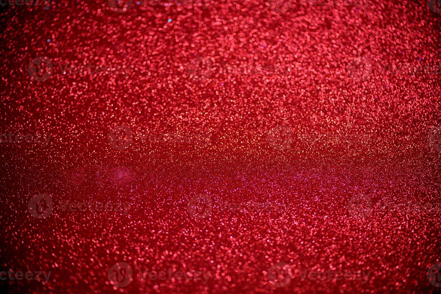 red glitter bokeh lights Blurred abstract background for Valentines, birthday, anniversary, wedding, new year and Christmas photo