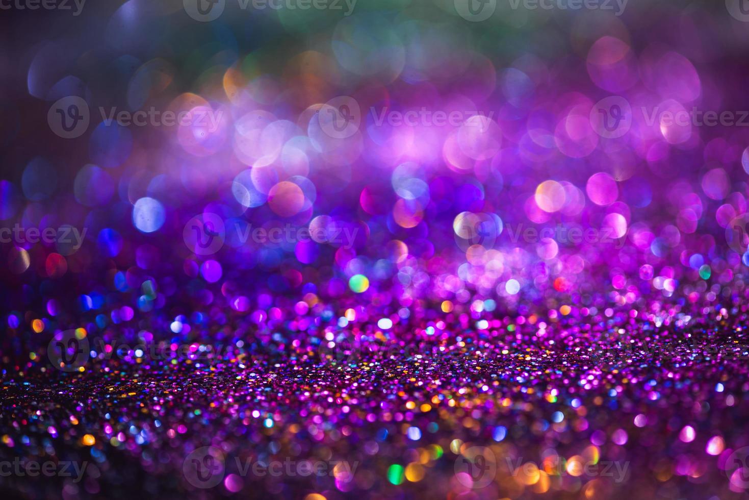 bokeh effect glitter colorful blurred abstract background for birthday, anniversary, wedding, new year eve or Christmas photo