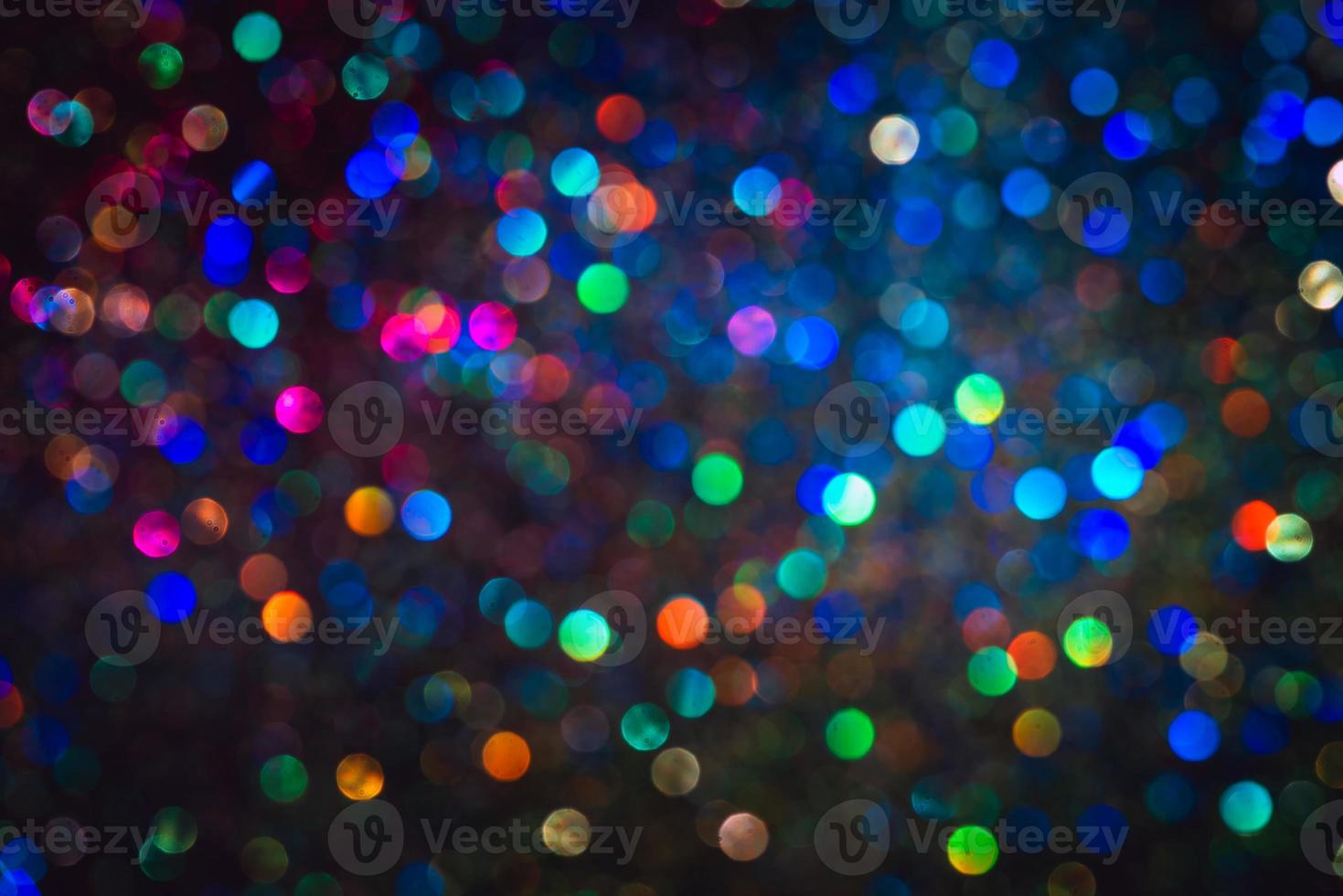 bokeh effect glitter colorful blurred abstract background for birthday, anniversary, wedding, new year eve or Christmas photo