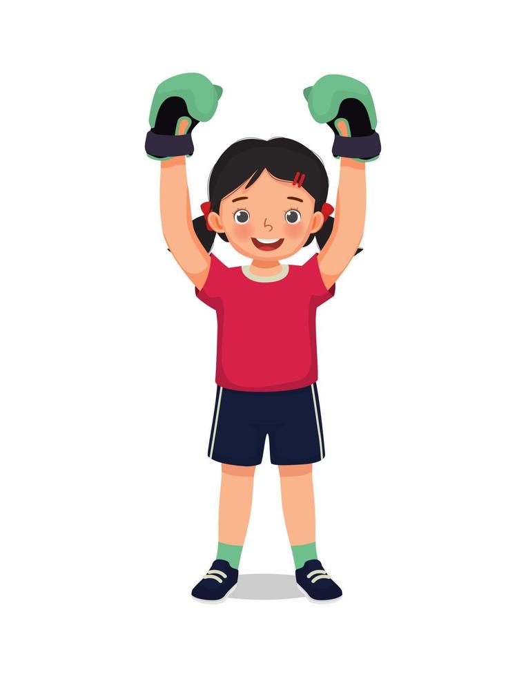 cute little girl boxer wearing boxing glove rejoices in a victory raising hands in winner position vector