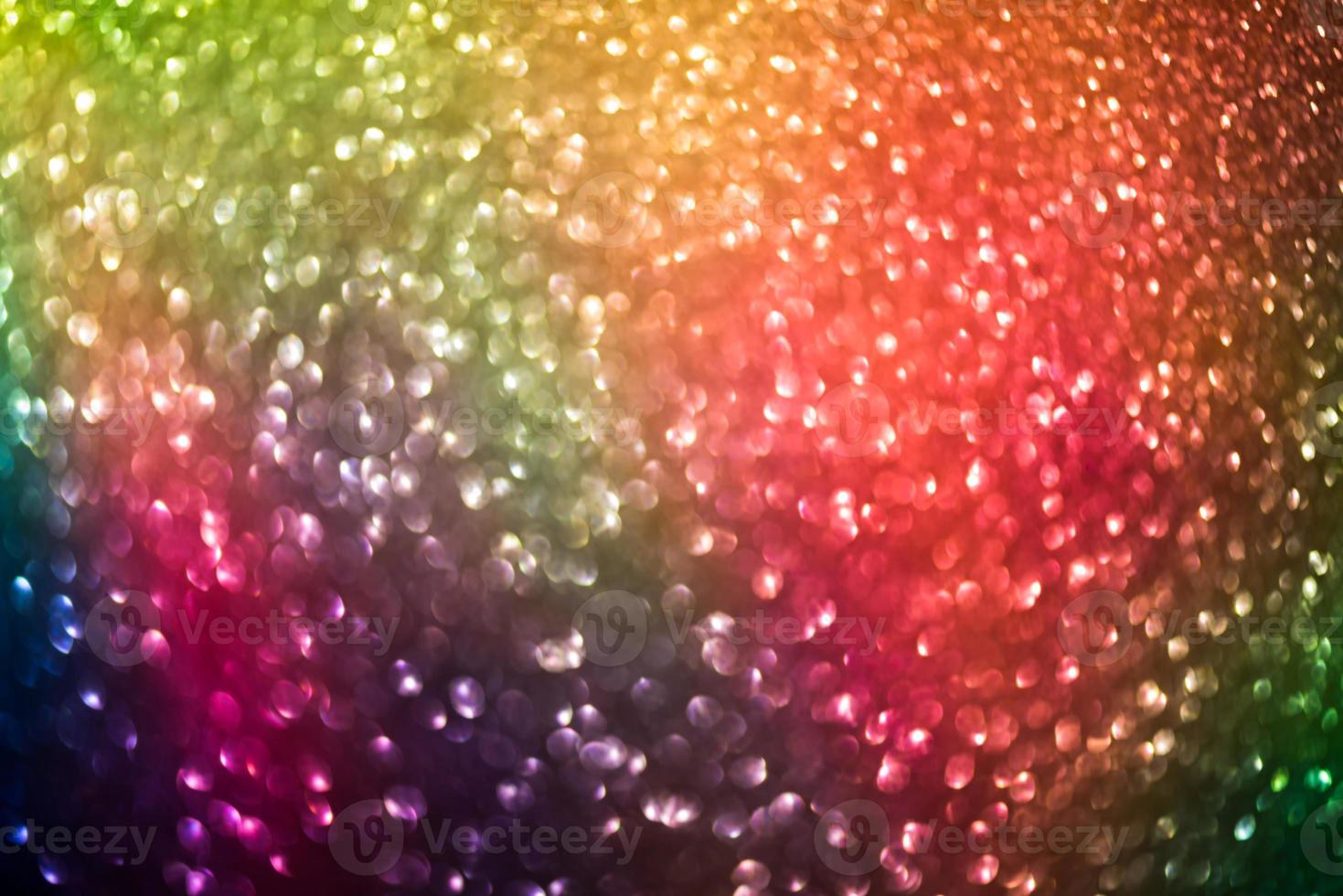 bokeh effect glitter colorful blurred abstract background for birthday, anniversary, wedding, new year eve or Christmas photo