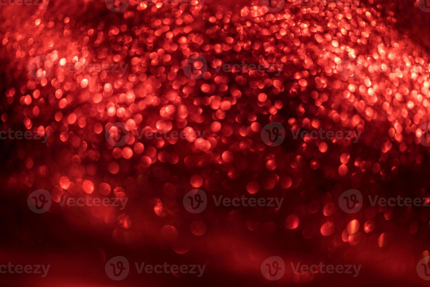 red glitter bokeh lights Blurred abstract background for Valentines, birthday, anniversary, wedding, new year and Christmas photo