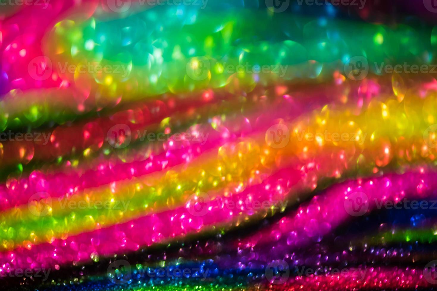bokeh effect glitter colorful blurred abstract background for birthday, anniversary, wedding, new year eve or Christmas photo