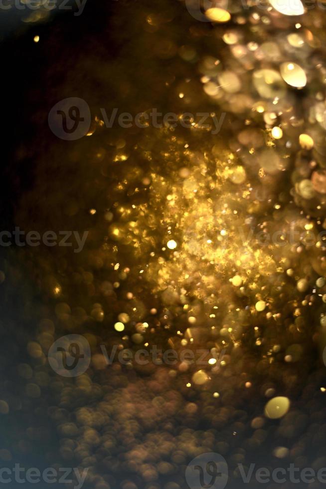 brillo dorado textura de iluminación bokeh fondo abstracto borroso para cumpleaños, aniversario, boda, nochevieja o navidad foto