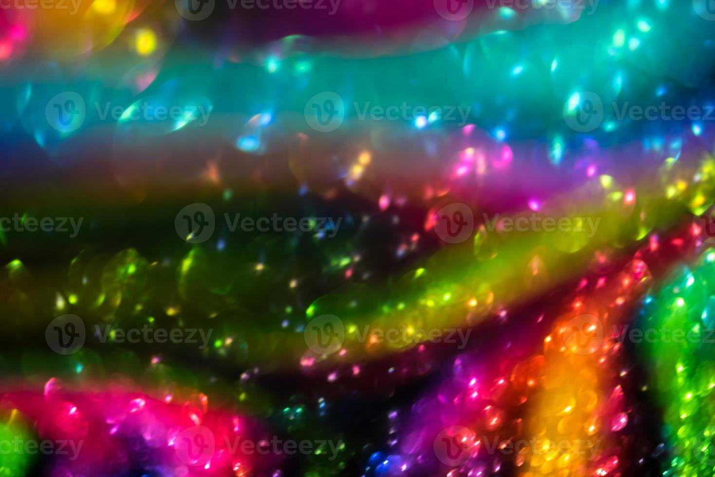 bokeh effect glitter colorful blurred abstract background for birthday, anniversary, wedding, new year eve or Christmas photo