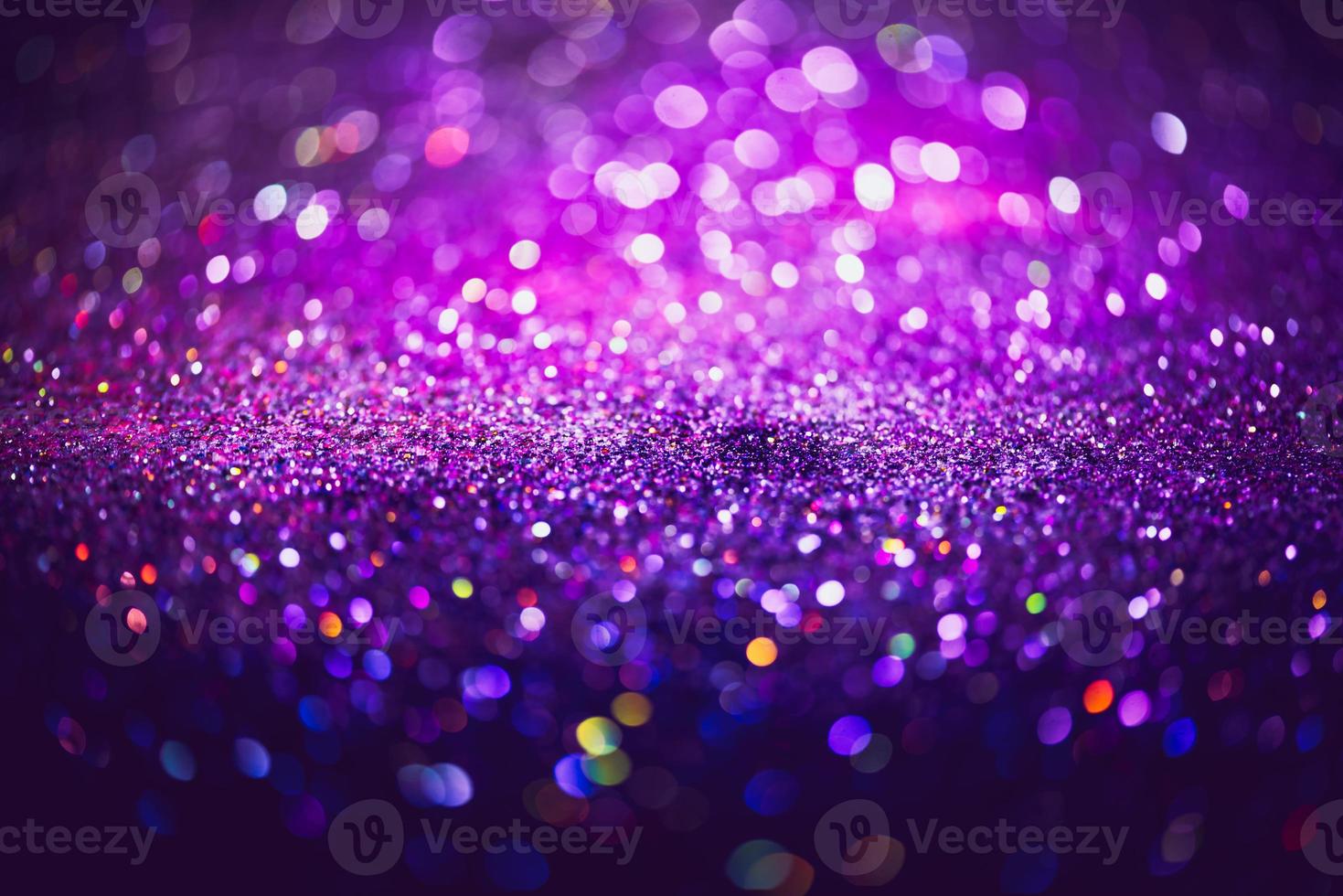 bokeh effect glitter colorful blurred abstract background for birthday, anniversary, wedding, new year eve or Christmas photo