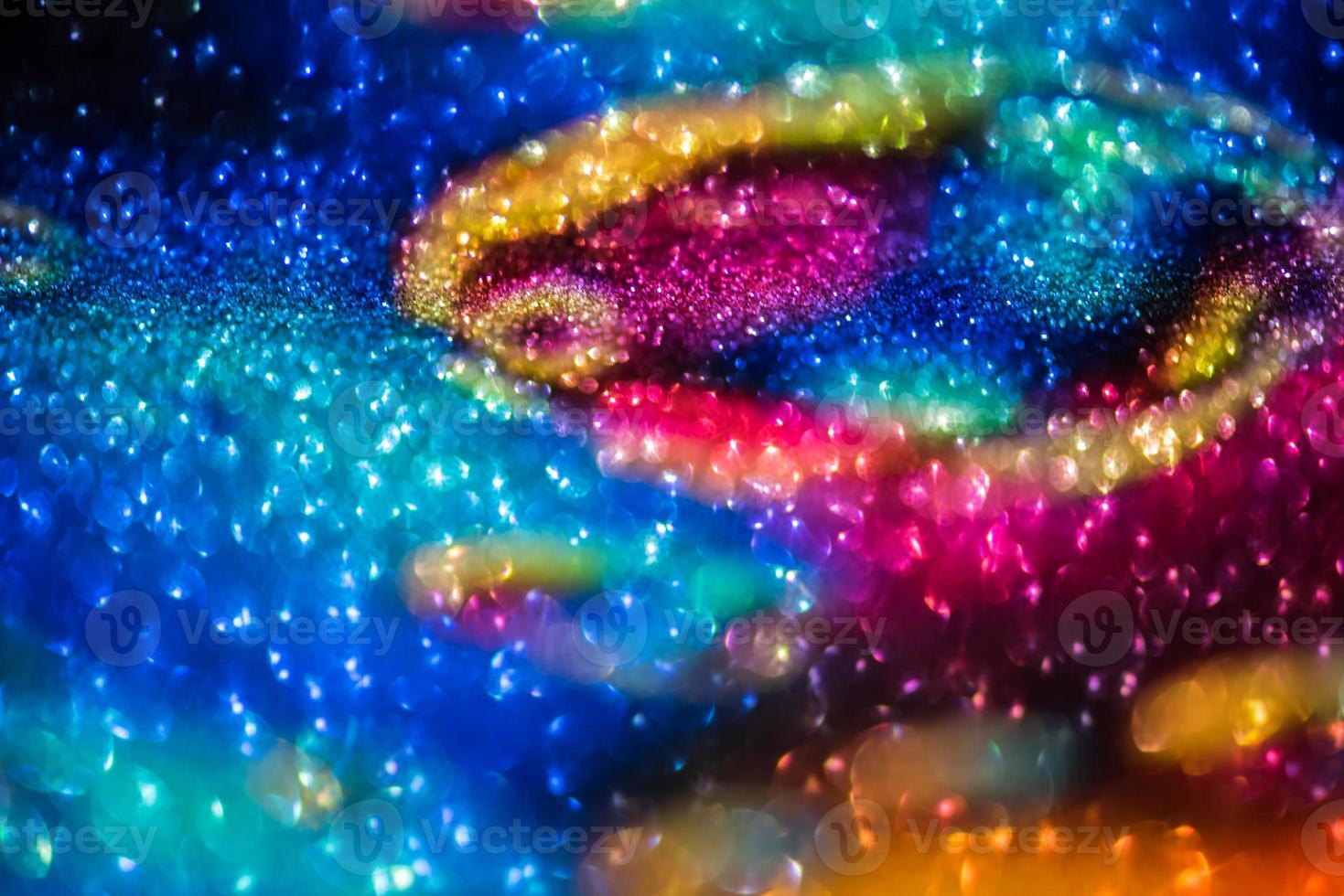 bokeh effect glitter colorful blurred abstract background for birthday, anniversary, wedding, new year eve or Christmas photo