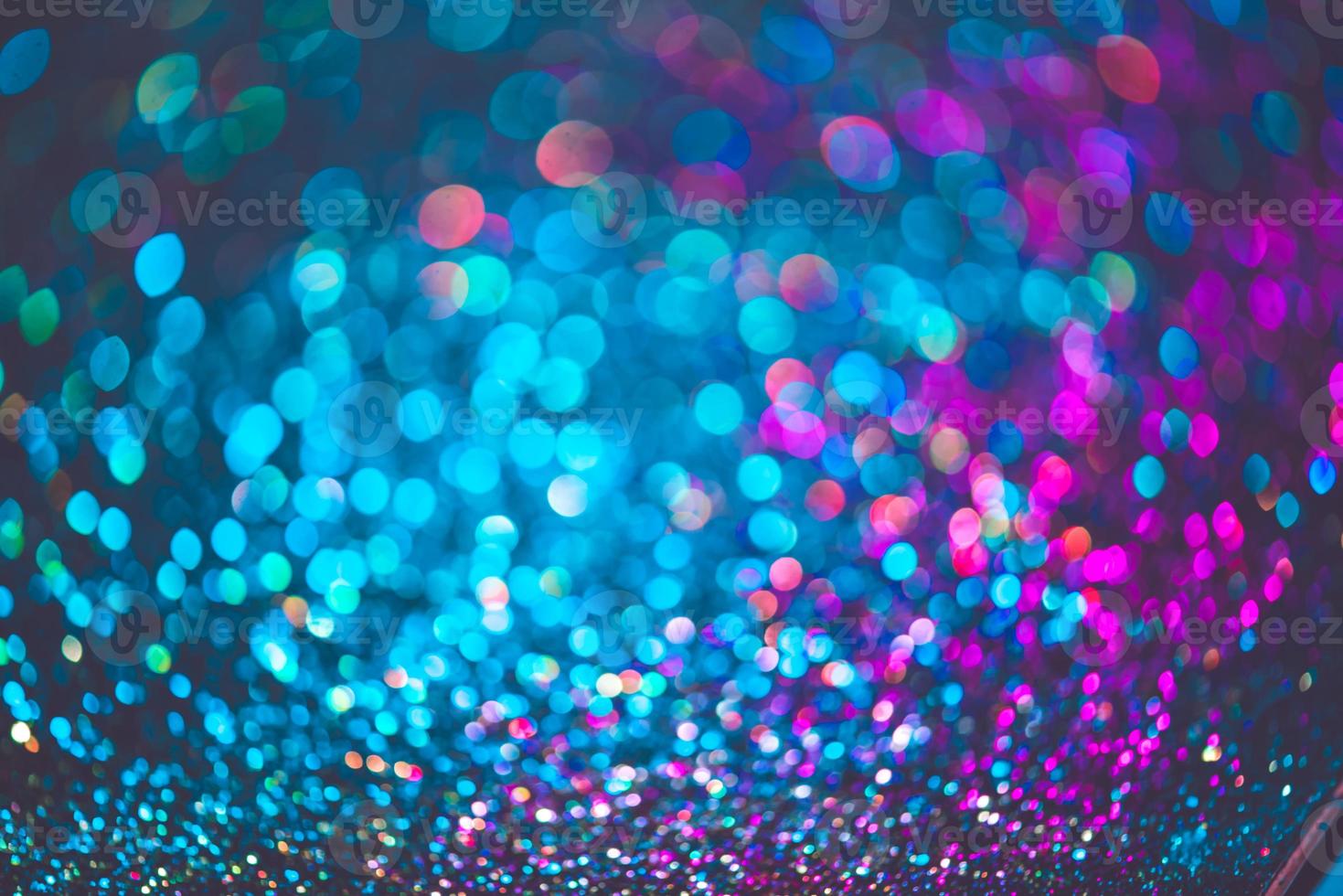 bokeh effect glitter colorful blurred abstract background for birthday, anniversary, wedding, new year eve or Christmas photo